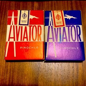 Vintage Aviator pinochle cards never opened. One set blue and one set red.